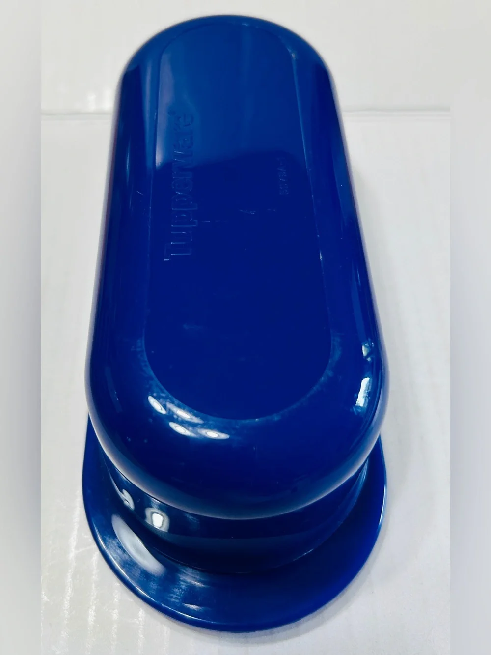 Tupperware impressions butter dish, navy blue, holds 1 stick of butter. NEW.
